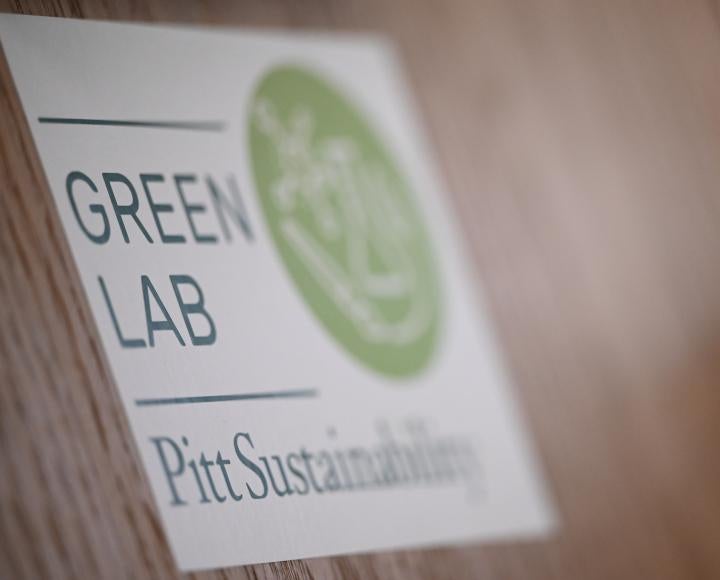 A sticker that reads "Green Lab, 51ƷƵ Sustainability"